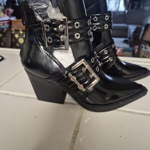 Sleek Black Heeled Boots with Buckle Detail
